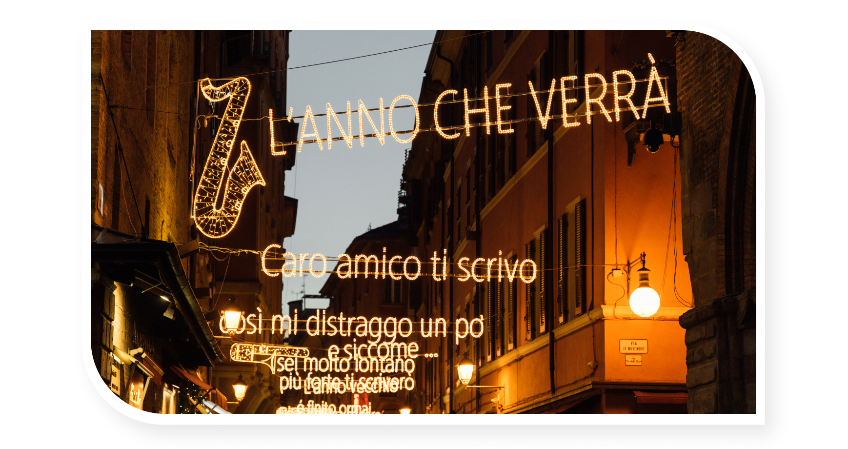 Street with Christmas sign in Bologna